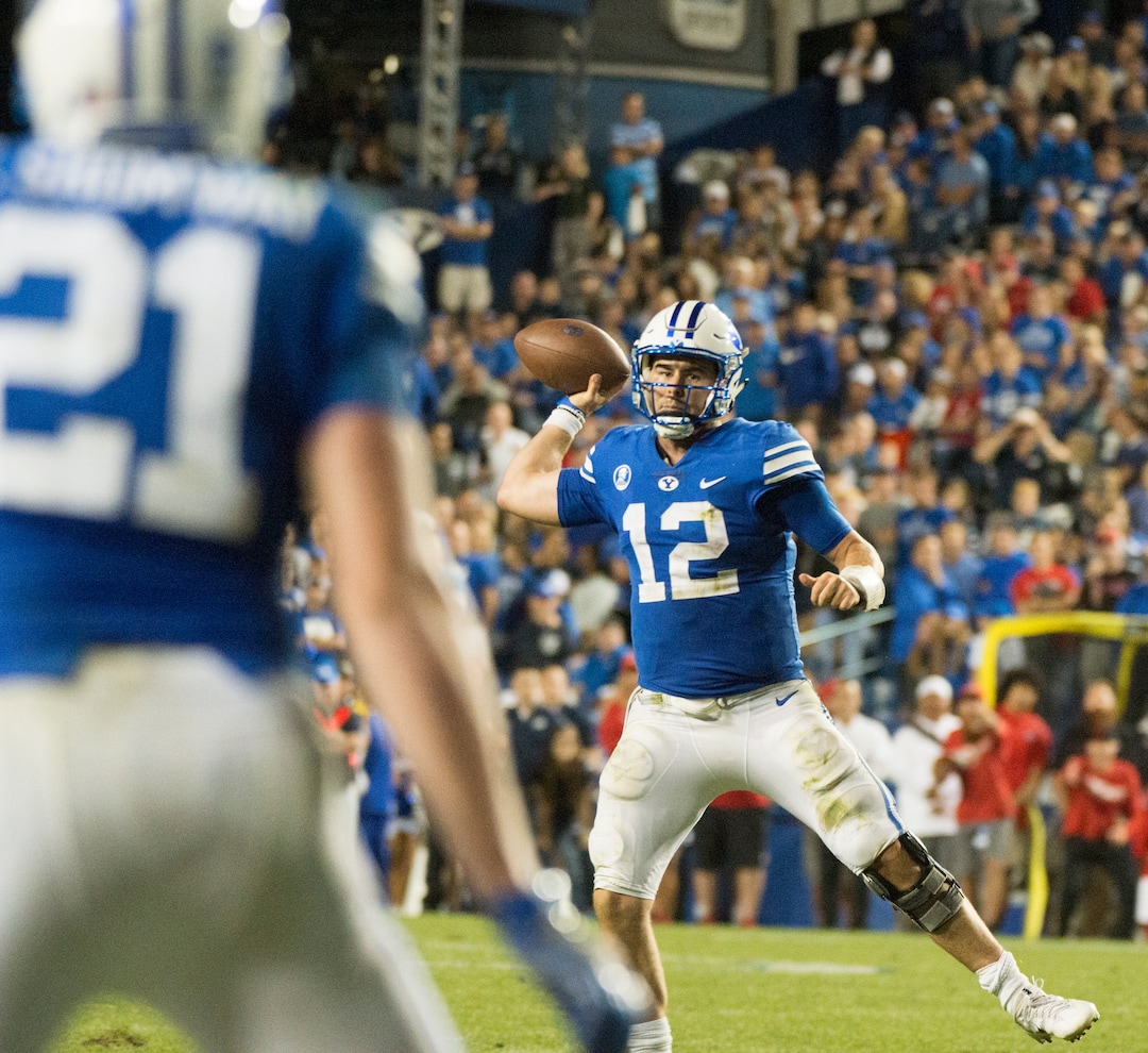 (Rick Egan  |  The Salt Lake Tribune)  Brigham Young Cougars quarterback Tanner Mangum (12) throws to Brigham Young Cougars wide receiver Talon Shumway (21), in football action BYU vs. Utah,  at Lavell Edwards Stadium in Provo, Saturday, September 9, 2017.