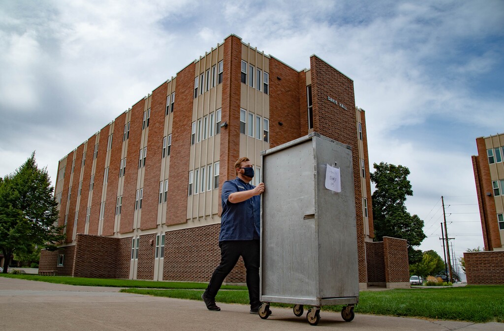 (Francisco Kjolseth | The Salt Lake Tribune) Bag lunches are delivered to four Utah State University dormitories on Monday, August 0831, 2020, where 287 residents were asked to quarantine after elevated levels of COVID-19 were found in wastewater samples.