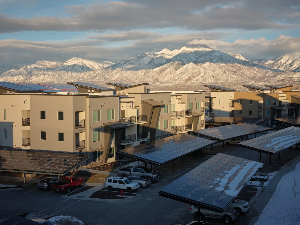 (Lindsay D'Addato | The New York Times)  Soleil Lofts, a solar-powered apartment complex in Herriman, Feb. 21, 2021. The solar energy collected at Soleil Lofts is stored in batteries that can be tapped by Rocky Mountain Power, the local utility.