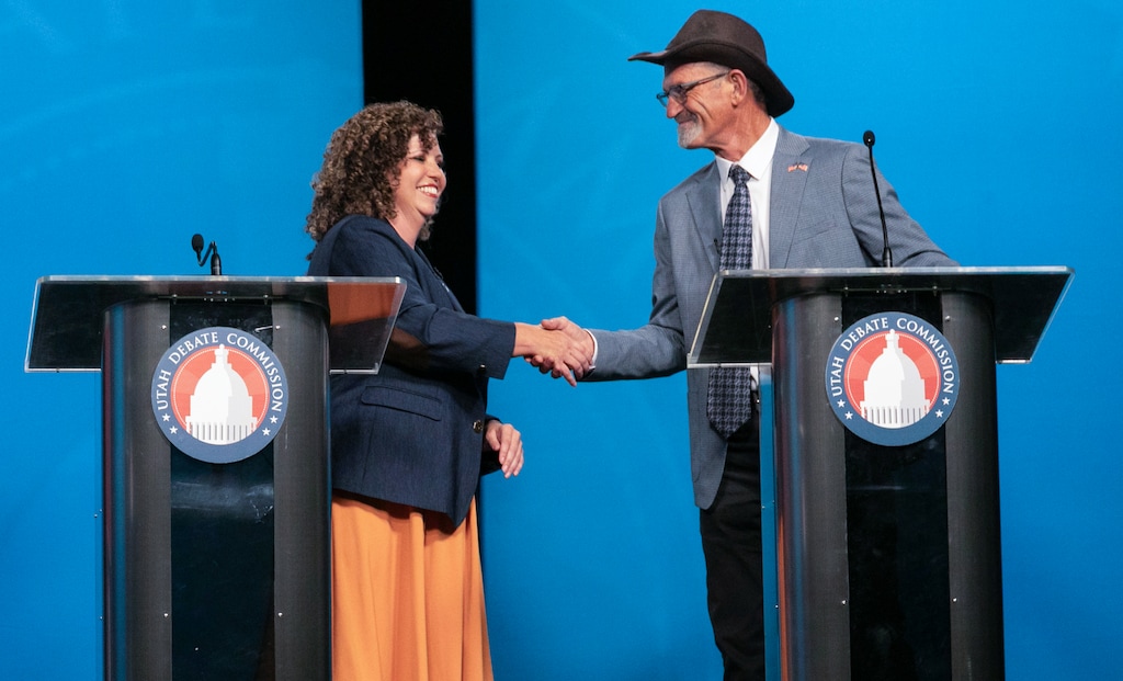 (Jud Burkett | Special to The Tribune) Republican Rep. Celeste Maloy, left, and Democratic challenger Kent Udell shake hands at the conclusion of their 3rd Congressional District debate at Utah Tech University in St. George, Friday, Oct. 2, 2026.