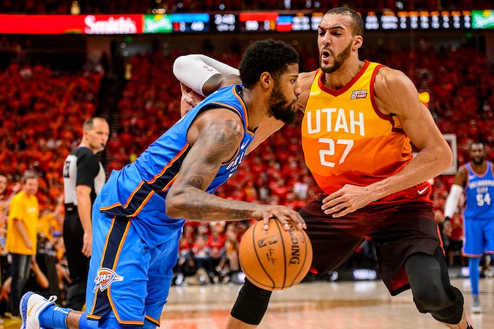 (Trent Nelson | The Salt Lake Tribune)  
Utah Jazz host the Oklahoma City Thunder, Game 3, NBA playoff basketball in Salt Lake City, Saturday April 21, 2018. Utah Jazz center Rudy Gobert (27) defends Oklahoma City Thunder forward Paul George (13).