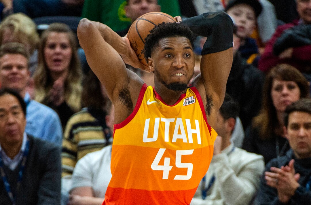 (Rick Egan  |  The Salt Lake Tribune)     Utah Jazz guard Donovan Mitchell (45) those the ball down court after grabbing a rebound, in NBA action between the Utah Jazz and thePortland Trail Blazers in Salt Lake City, Friday, Feb. 7, 2020.