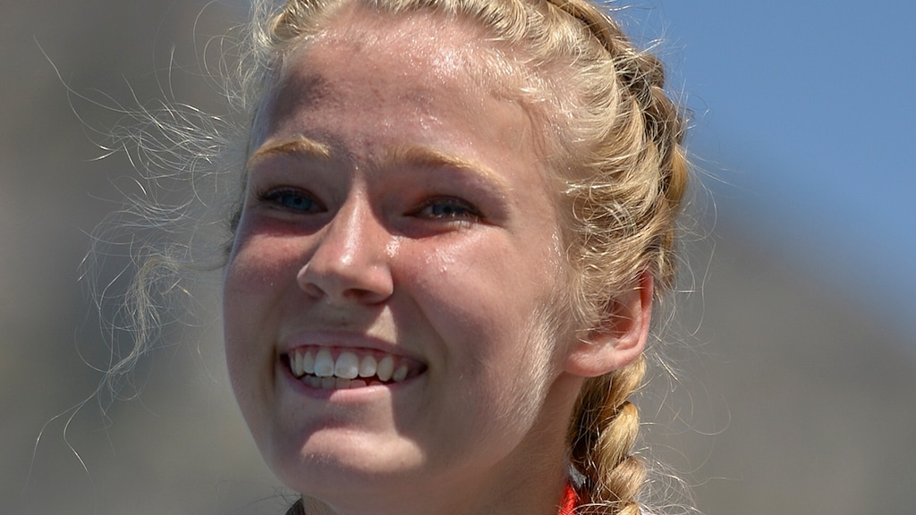 (Leah Hogsten | The Salt Lake Tribune) Provo's Meghan Hunter smiles on the podium after taking 1st in the 5A Girls' 800 Meter at the 2018 Utah UHSAA State Track and Field Championships at Clarence Robison Track on the campus of Brigham Young University in Provo, Thursday, May 17, 2018.