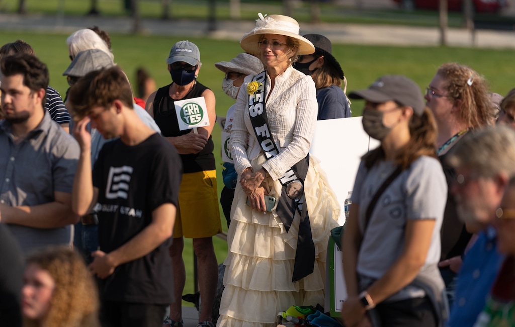 (Francisco Kjolseth | The Salt Lake Tribune) Erin Preston, dressed as her great, great grandmother, Lucy Augusta Rice Clark who she says was the first woman to vote in a Republican National Convention joins the rally on Women’s Equality Day at the Capitol on Thursday, Aug. 26, 2021, to encourage Utah to ratify the Equal Rights Amendment.