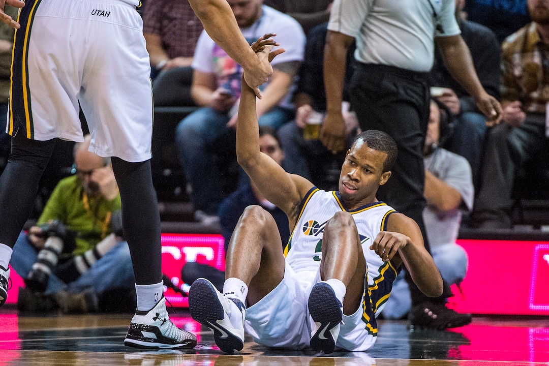 Chris Detrick  |  The Salt Lake TribuneUtah Jazz guard Rodney Hood (5) is helped up during the game at EnergySolutions Arena Friday December 5, 2014.  
