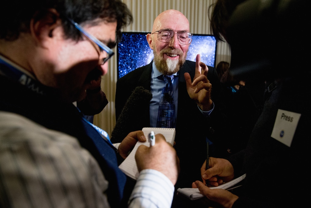 Laser Interferometer Gravitational-Wave Observatory (LIGO) Co-Founder Kip Thorne speaks to members of the media following a news conference at the National Press Club in Washington, Thursday, Feb. 11, 2016, as it is announced that scientists they have finally detected gravitational waves, the ripples in the fabric of space-time that Einstein predicted a century ago. The announcement has electrified the world of astronomy, and some have likened the breakthrough to the moment Galileo took up a telescope to look at the planets. (AP Photo/Andrew Harnik)