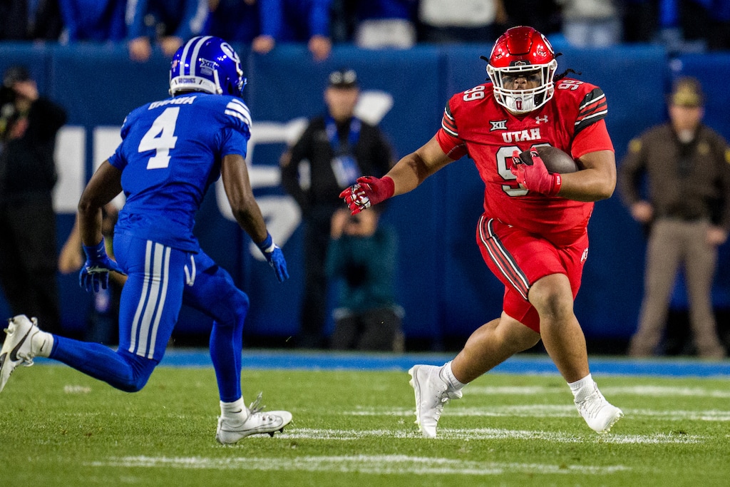 (Trent Nelson | The Salt Lake Tribune) Utah Utes defensive tackle Semi Taulanga (99) makes a play in a game against BYU last season.