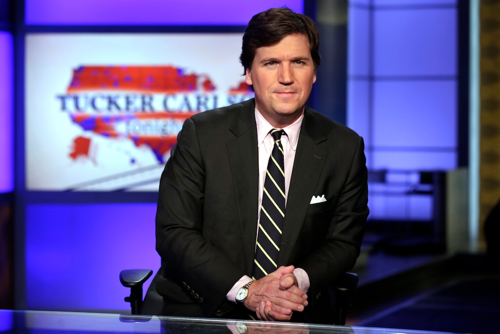 (Richard Drew | Associated Press file photo) In this March 2, 2017 file photo, Tucker Carlson, host of "Tucker Carlson Tonight," poses for photos in a Fox News Channel studio, in New York. The liberal advocacy group Media Matters for America this week released two batches of recordings Carlson made as a guest on a radio show where he made denigrating remarks about race and gender. It was timed to coincide with Fox’s first-ever sales meeting with advertisers on March 12, 2019. Media Matters says it wants to pressure Fox into better behavior by making advertisers aware of what is being said on the air. Carlson says critics want to shut Fox down.