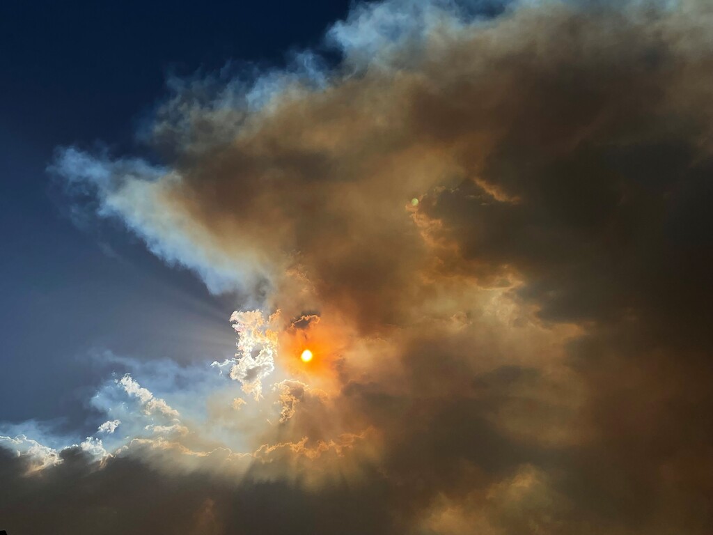 (Trent Nelson | The Salt Lake Tribune) The view from Riverton as wildfire smoke enters the Salt Lake Valley on July 9, 2022. A record-breaking snowy 2022-2023 winter has kept Utah's skies smoke-free — for now.