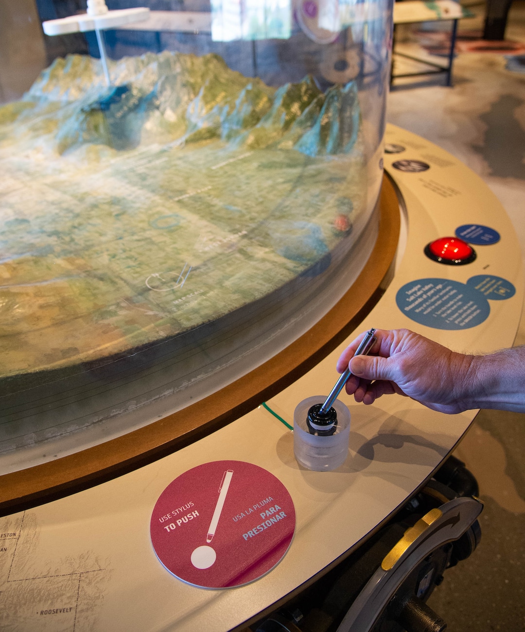 (Francisco Kjolseth  |  The Salt Lake Tribune) Mark Ingalls, IT Manager for the Natural History Museum of Utah, uses a stylus to interact with the updated displays at the museum. The price of admission will provide visitors with a stylus, as museum staff talks about updates that have been made to hopefully reopen the museum in mid-August.