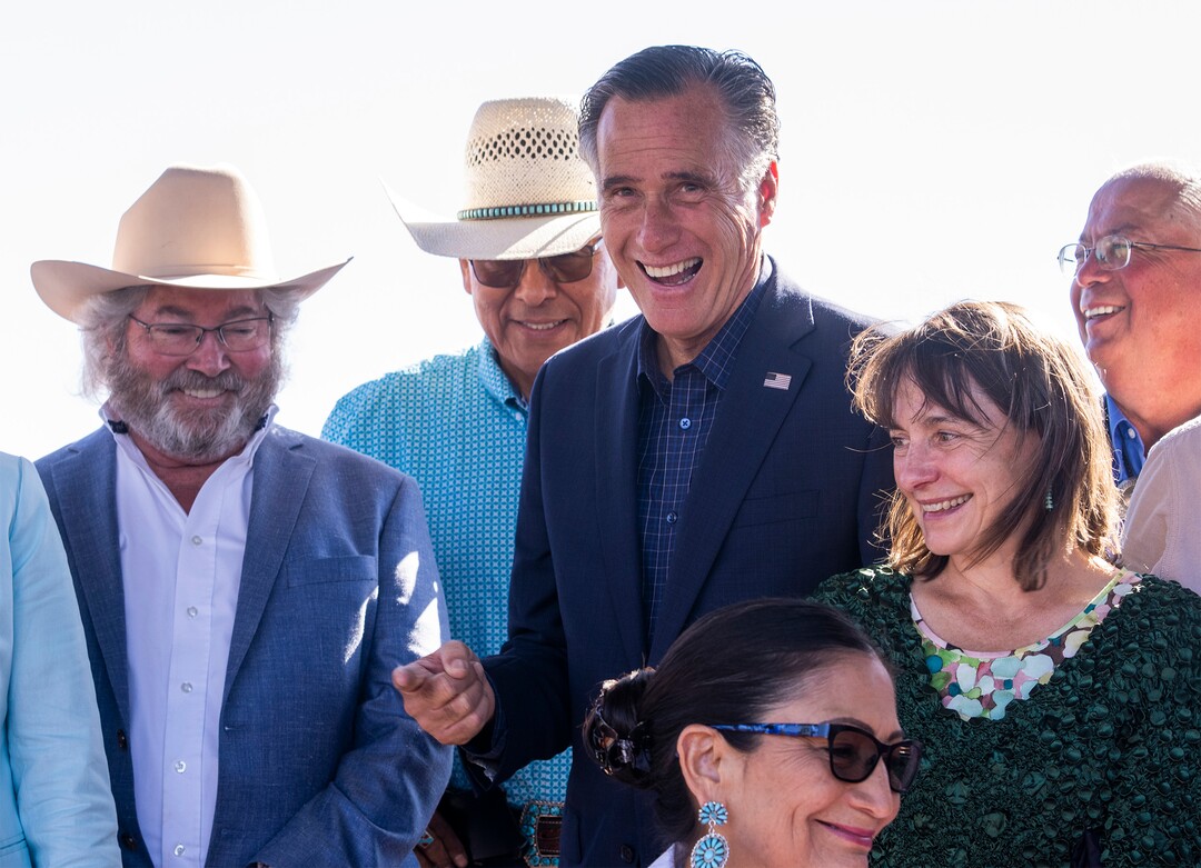 (Rick Egan | The Salt Lake Tribune) U.S. Sen. Mitt Romney jokes with the crowd before they sign the agreement for the Navajo federal reserved water rights settlement Friday, May 27, 2022.