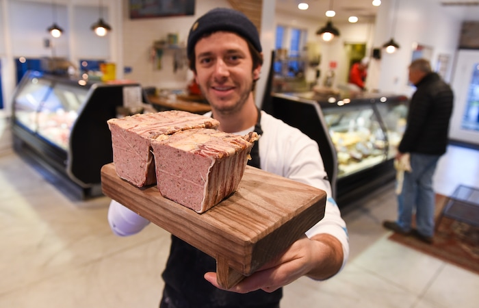 (Francisco Kjolseth  |  The Salt Lake Tribune)  Phillip Grubisa, owner of Salt Lake City's Beltex Meats, shows off their country pate, a rustic French-style terrine made with pork liver, shoulder and cured pork jowl.