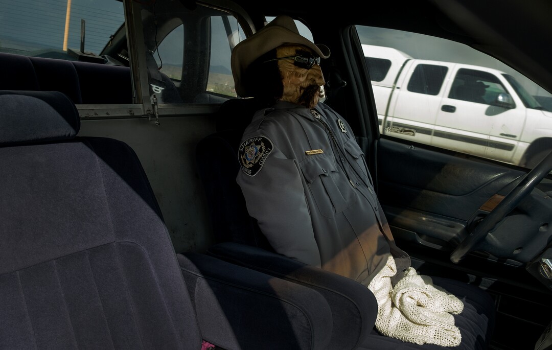 (Leah Hogsten  |  The Salt Lake Tribune) Parked on the shoulder of Highway 24, Wayne County sheriff's "deputy" Parker Doolittle deters would be speeders in the small town of Loa, Utah, Sept. 13, 2017.