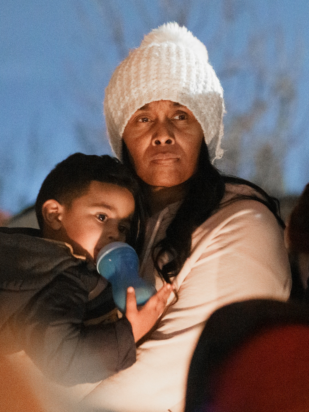 (Leah Hogsten | The Salt Lake Tribune) Paula Harris, mother of Brittany Tichenor-Cox, listens as others pay tribute to the life of her granddaughter Izzy Tichenor, Nov. 9, 2021. Hundreds joined the Tichenor family in mourning the death of 10-year-old Isabella "Izzy" Tichenor during a vigil at Foxboro Hollow Park in North Salt Lake on Tuesday.