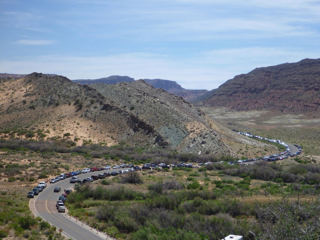 | Courtesy Arches National Park

The number of parking spaces was recently doubled to 160 at Wolfe Ranch trailhead to Delicate Arch in Arches National Park. Park officials report 2,000 people visit the trailhead each day during the peak season. As a result, many visitors park illegally along the road leading Delicate Arch viewpoint and trailhead.  There were 145 cars parked along the road in this picture taken May 25, 2013. The Park Service have proposed a reservation system to reduce this level of congestion, which officials say is degrading the park experience.