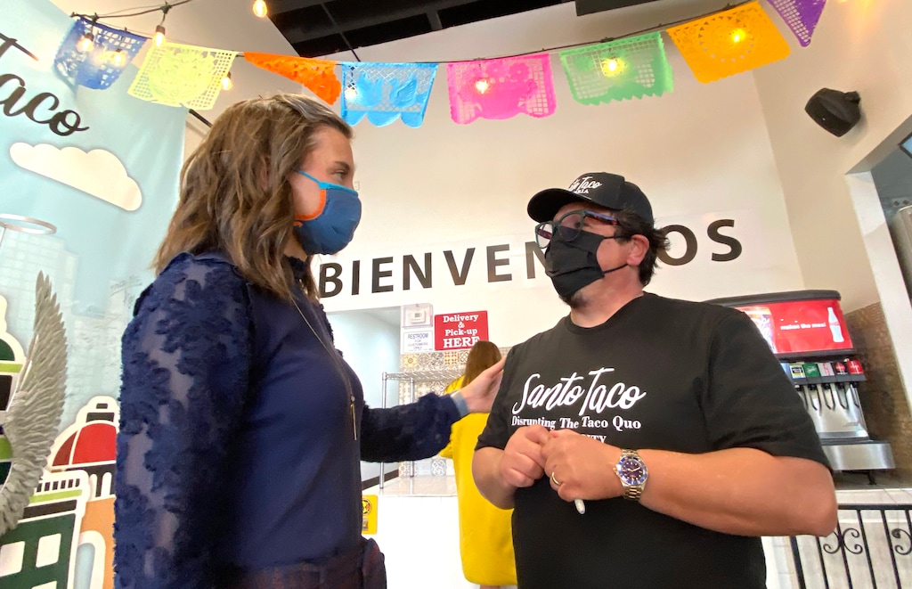 (Rick Egan | The Salt Lake Tribune) Salt Lake City Mayor Erin Mendenhall chats with SantoTaco owner Alfonso Brito, after a news conference encouraging people to keep wearing masks, after the state mask mandate ends, Friday, March 19, 2021.