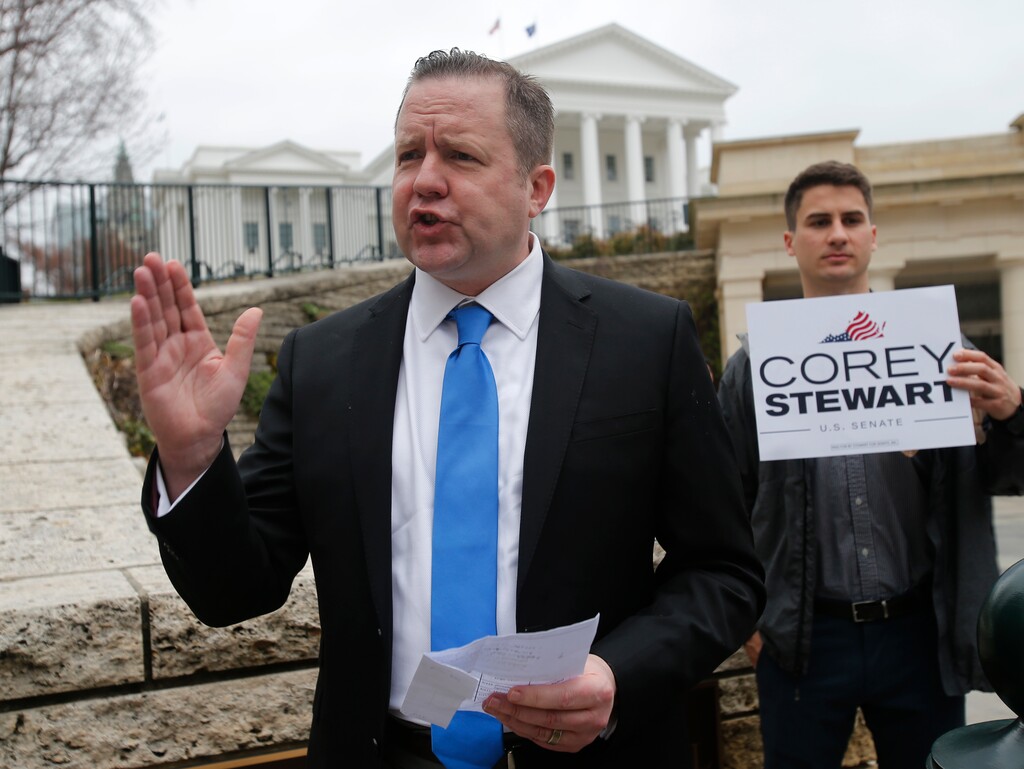(Steve Helber | The Associated Press) In this Feb. 22, 2018, file photo, Virginia GOP senatorial hopeful Corey Stewart gestures during a news conference at the Capitol in Richmond, Va. Stewart, a conservative provocateur and supporter of President Donald Trump, won Virginia's Republican primary Tuesday, June 12, 2018, in the U.S. Senate race, and he has promised to run a "vicious" campaign against incumbent Tim Kaine.