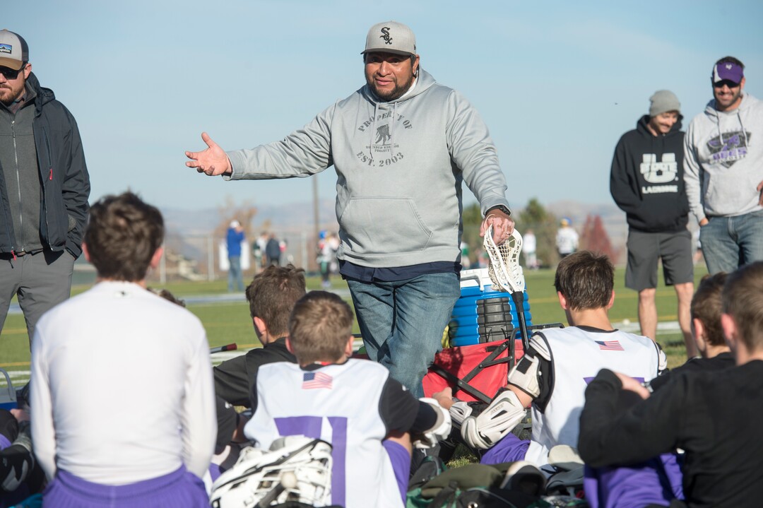 (Rick Egan | The Salt Lake Tribune) Box Elder lacrosse coach Juan Gaytan talks to his team between games during a tournament in Logan on Saturday, Nov. 3, 2018.