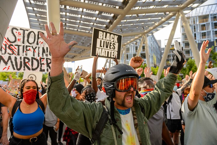(Trent Nelson  |  The Salt Lake Tribune) Protesters in front of the Public Safety Building during a protest against police brutality in Salt Lake City on Monday, June 1, 2020.