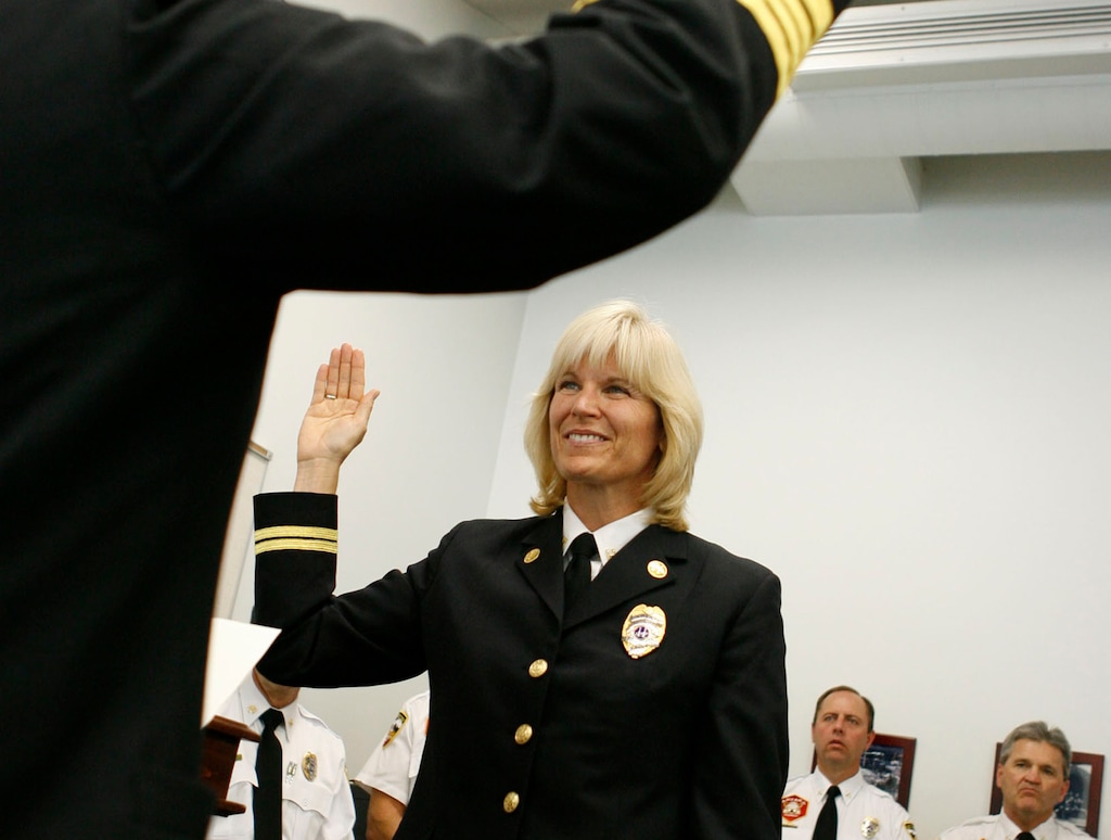 (Francisco Kjolseth  |  Salt Lake Tribune file photo) Martha Ellis is sworn in as division chief for the Salt Lake City Fire Department in 2009. Her lawsuit against the city and three of her former bosses has been moved a bit closer to trial, after a U.S. Court of Appeals ruling.