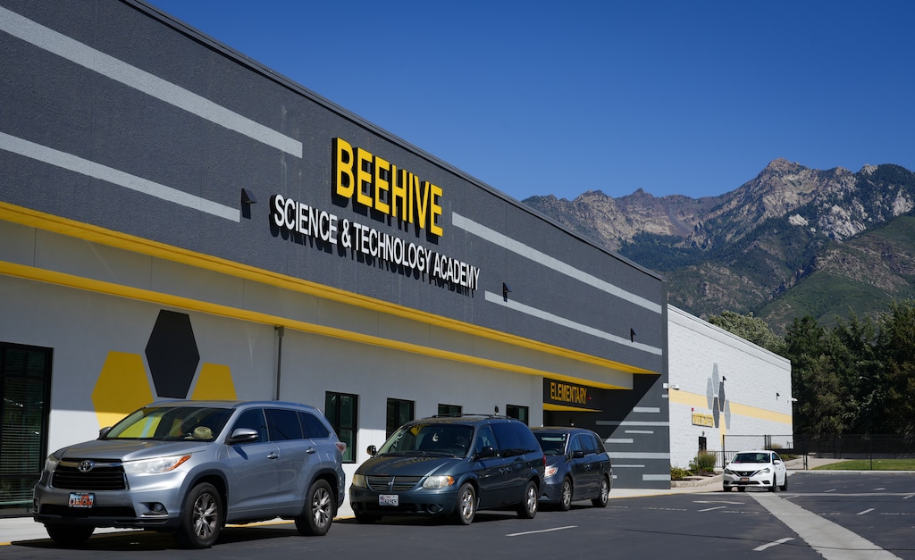 (Bethany Baker | The Salt Lake Tribune) Vehicles line up to pick up students after school at Beehive Science and Technology Academy in Sandy. For the fifth year in a row, Beehive claimed the top spot as Utah's No. 1 high school.