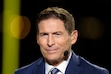 FILE - ESPN Monday Night Football commentator Steve Young is seen before an NFL football game between the New Orleans Saints and the Baltimore Ravens, Monday, Nov. 7, 2022, in New Orleans. Jeff Van Gundy, Suzy Kolber, Jalen Rose and Steve Young are among roughly 20 ESPN commentators and reporters who were laid off on Friday, June 30, 2023, as part of job cuts by the network. (AP Photo/Tyler Kaufman, File)