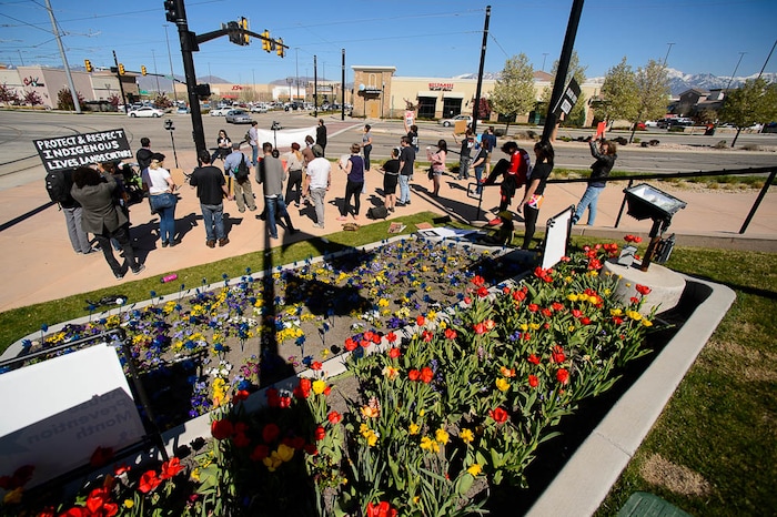 (Trent Nelson | The Salt Lake Tribune)
Utah Against Police Brutality holds a rally in front of West Valley City Hall, Saturday April 21, 2018. Elijah Smith was killed by West Valley Police on April 8 after he ran from them into a home. They shot him in the home's garage, while one hand was in the air and the other, activists say, appeared to be coming up, too. After body camera footage was released, the group began to call for the officer's firing.