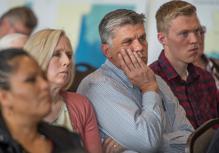 (Leah Hogsten  |  The Salt Lake Tribune)   San Juan County commissioner Phil Lyman, wife Jody and son Davin listen to Dr. Bernard Grofman, a political scientist at the University of California, Irvine who was hired to redraw the county commission and school board districts, at a public hearing in Monticello, November 16, 2017. The new boundaries would ensure significant American Indian majorities in two of three County Commission districts and on four of five school board voting districts as the result of a January 2012 lawsuit filed in U.S. District Court by the Navajo Nation. The lawsuit seeks the redrawing of voting districts to reflect the 2010 U.S. Census.