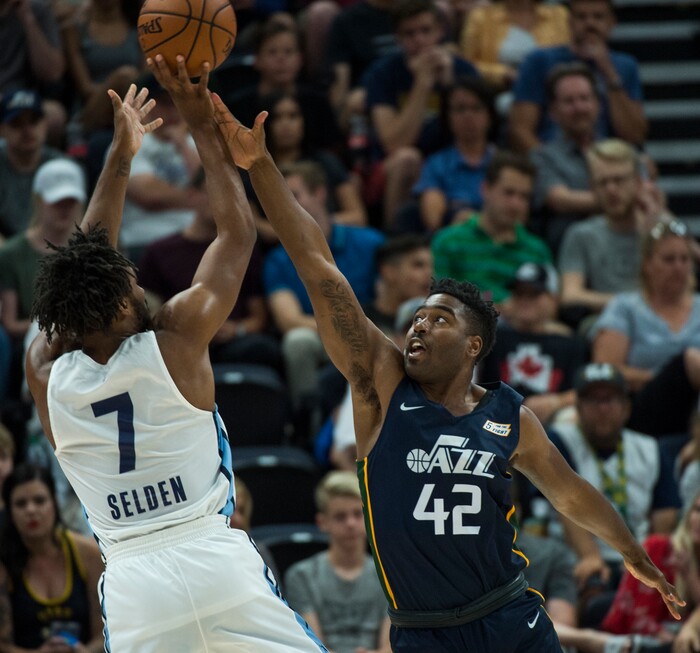 (Rick Egan  |  The Salt Lake Tribune)     Memphis Grizzlies guard Wayne Seldes (7) takes a shot as Utah Jazz forward Kelan Martin (42) defends, in Jazz summer league action between Utah Jazz and Memphis Grizzlies in Salt Lake City, Tuesday, July 3, 2018.