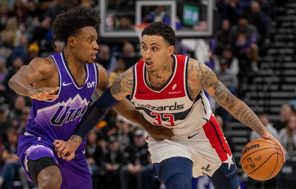(Rick Egan | The Salt Lake Tribune)  Utah Jazz guard Collin Sexton (2) guards Washington Wizards forward Kyle Kuzma (33), in NBA action at the Delta Center, on Monday, March 4, 2024. Kuzma was traded from Washington to the Milwaukee Bucks before Thursday's NBA trade deadline.