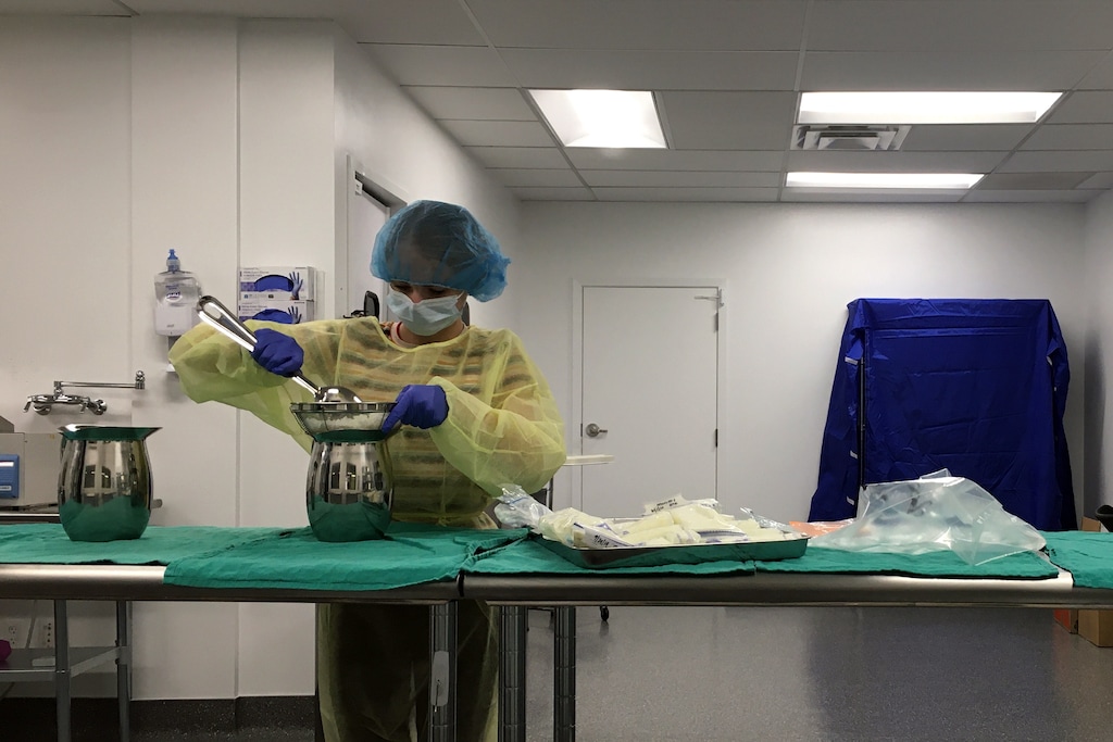 (Erin Alberty  |  The Salt Lake Tribune) A lab worker demonstrates the process used in the new human milk pasteurization facility now open in South Salt Lake. The Mountain West Mothers' Milk Bank, Utah's first fully operational milk bank, sorts, thaws, treats and refreezes donated breast milk for medically fragile infants. The facility is located in South Salt Lake at 2995 S. West Temple.