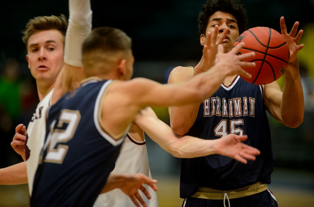 (Steve Griffin  |  The Salt Lake Tribune) Herriman's Kase Petereson grabs a pass during 6A basketball playoff game against Lone Peak at the Utah Valley UniversityÕs UCCU Center in Provo Tuesday Feb. 27, 2018.