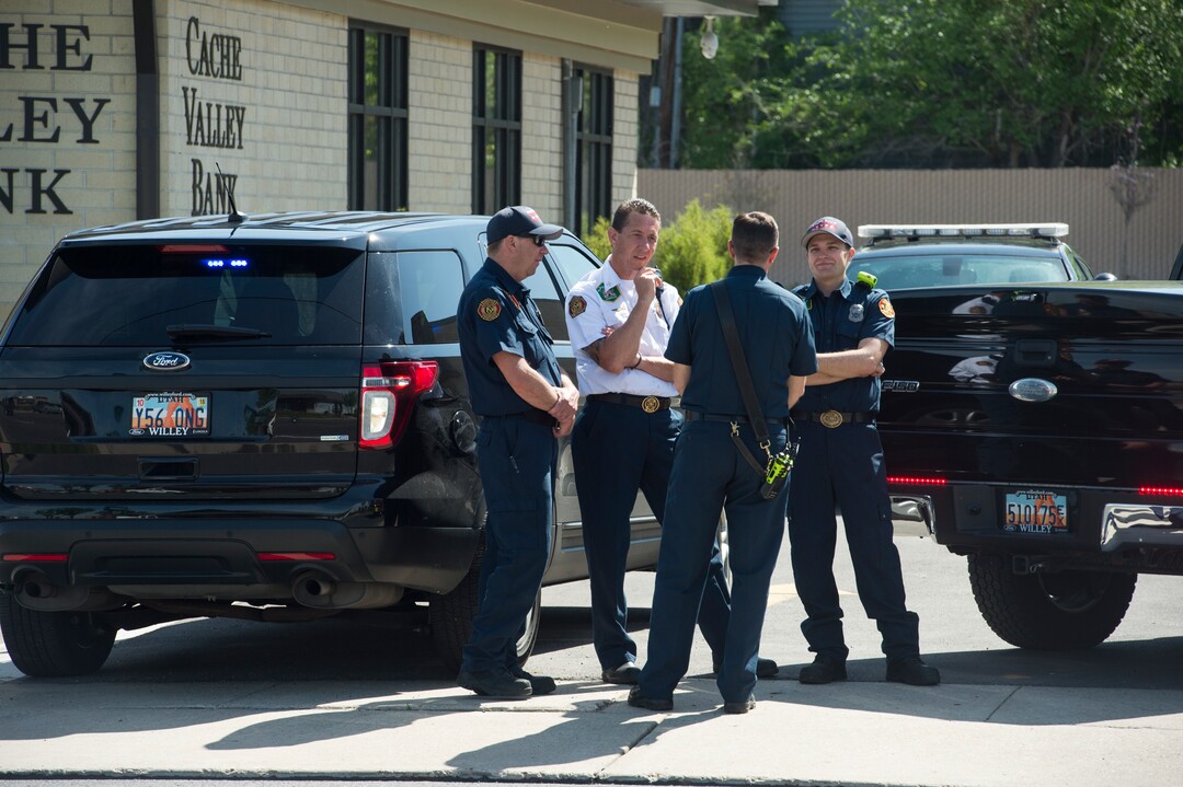 (Rick Egan  |  The Salt Lake Tribune)   Bountiful police investigate after they say a store clerk shot an armed robbery suspect at Bountiful Pawn and Sales on Thursday, May 3, 2018. Police are looking for a second suspect in the attempted armed robbery.