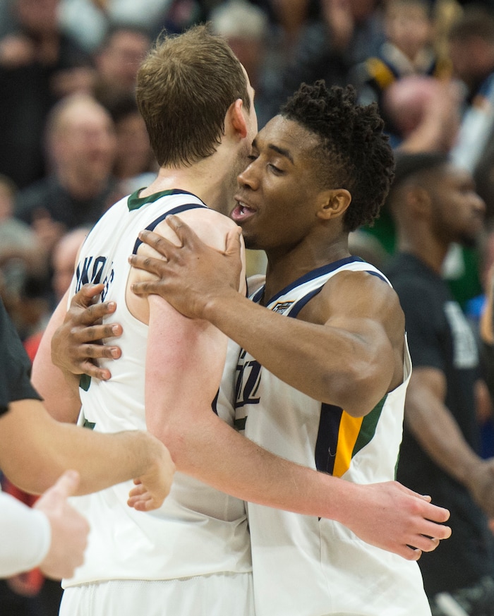 (Rick Egan  |  The Salt Lake Tribune)  Utah Jazz guard Donovan Mitchell (45) hugs Utah Jazz forward Joe Ingles (2), after  Jazz defeated the Spurs 101-99, in NBA action in Salt Lake City, Monday, February 12, 2018.