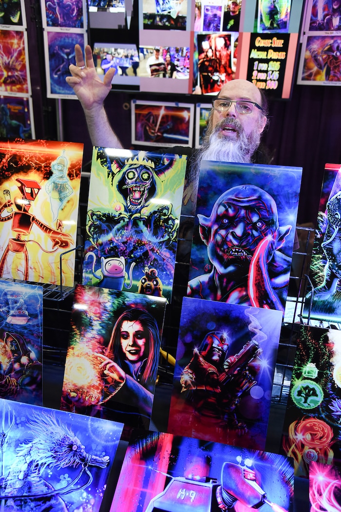 (Francisco Kjolseth  |  The Salt Lake Tribune)  Artist Jerry Pesce shows off his work as he attends the start of FanX Salt Lake Comic Convention at the Salt Palace in Salt Lake City Thursday, Sept. 6, 2018, during the three-day pop culture convention.