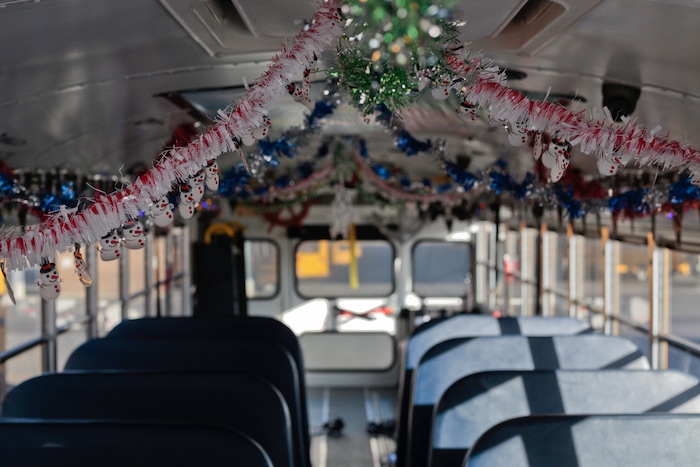 A bus that Don Fitch drives is decorated for Christmas on Tuesday, Dec. 19, 2017 in American Fork, Utah.  "I've been decking the halls a bit at a time," Don Fitch said.  He has driven school buses for the Alpine School District for the past four years. Every year around Christmas, he decorates the bus’s interior with Christmas decorations, plays Christmas music and dresses up as Santa.   (Evan Cobb /The Daily Herald via AP)