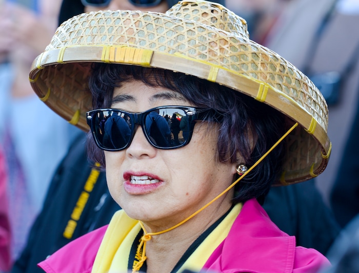 Leah Hogsten  |  The Salt Lake Tribune  Gerry Low-Sabado, who is a descendant of Chinese rail workers that laid track throughout CaliforniaÕs coast watched as the two steam locomotives met in Ogden.   In celebration for the 150th anniversary of the transcontinental railroadÕs completion, Union Pacific's iconic steam locomotives, Living Legend No. 844 and Big Boy No. 4014 met at Ogden Union Station, May 9, 2019. 