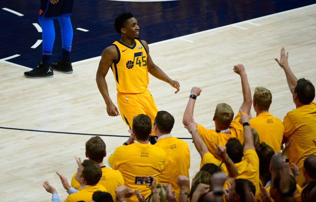 (Scott Sommerdorf | The Salt Lake Tribune)
Utah Jazz guard Donovan Mitchell (45) celebrates the win over the Thunder with the fans. The Utah Jazz defeated the Oklahoma City Thunder 96-91 to win the first round playoff series, Friday, April 27, 2018.