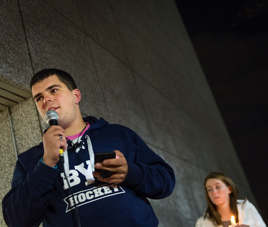 Michael Mangum  |  Special to the TribuneJacob Payne, a sophomore at BYU, speaks during a candlelight vigil he organized outside the N. Eldon Tanner Building on the campus of BYU in Provo, UT on Wednesday, December 5th, 2018. The vigil was held as a memorial for a student who died by suicide inside the building.