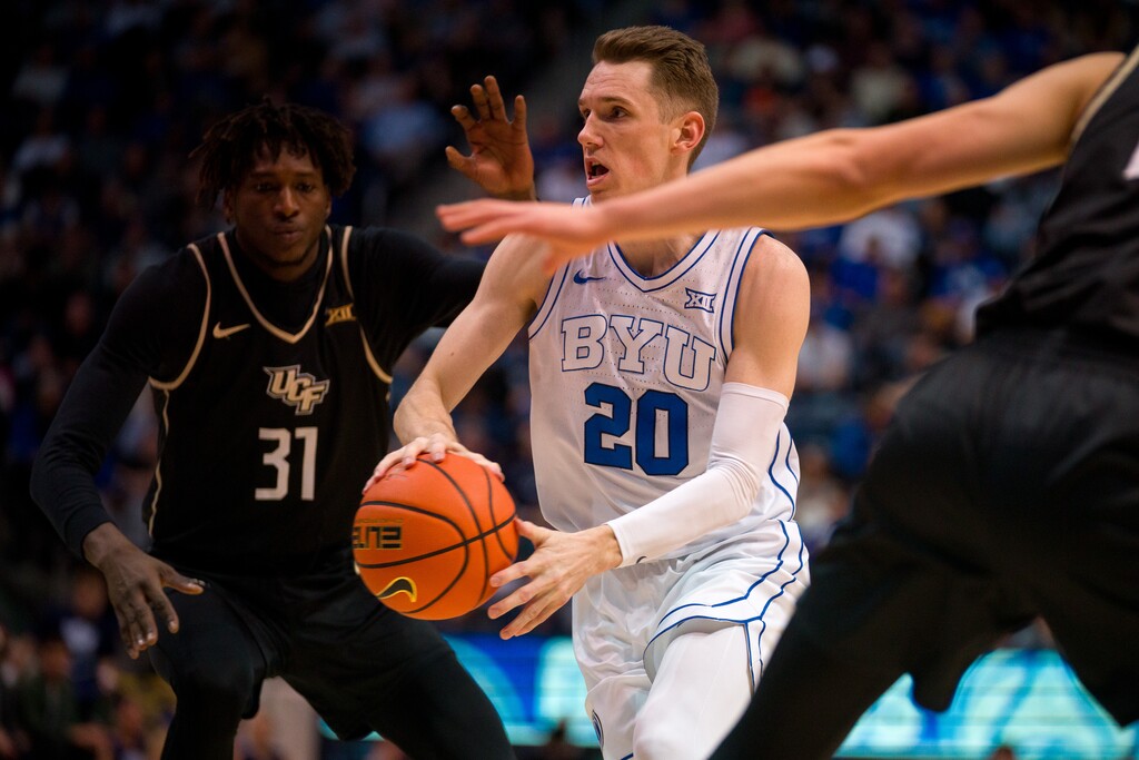 (Trent Nelson | The Salt Lake Tribune) Brigham Young Cougars guard Spencer Johnson (20) as BYU hosts University of Central Florida, NCAA basketball in Provo on Tuesday, Feb. 13, 2024.