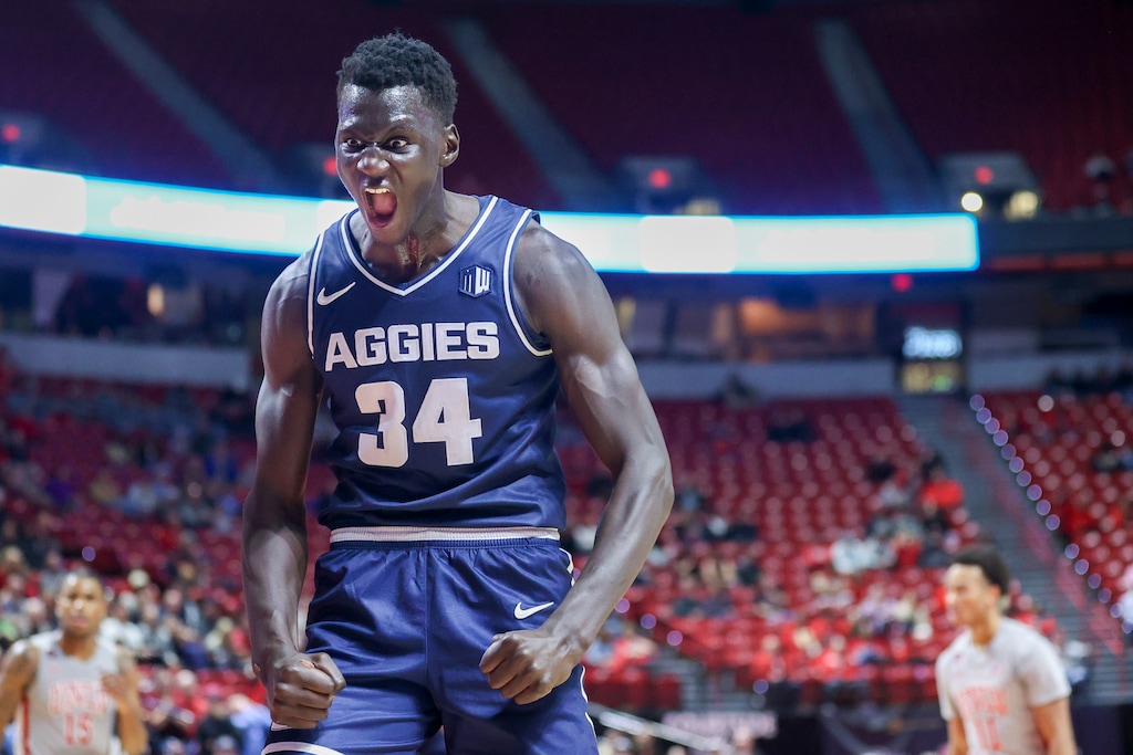 Utah State forward Kalifa Sakho (34) yells after his teammate, forward Great Osobor, not pictured, made a basket while being fouled against UNLV during the second half of an NCAA college basketball game Saturday, Jan. 13, 2024, in Las Vegas. (AP Photo/Ian Maule) \ut1