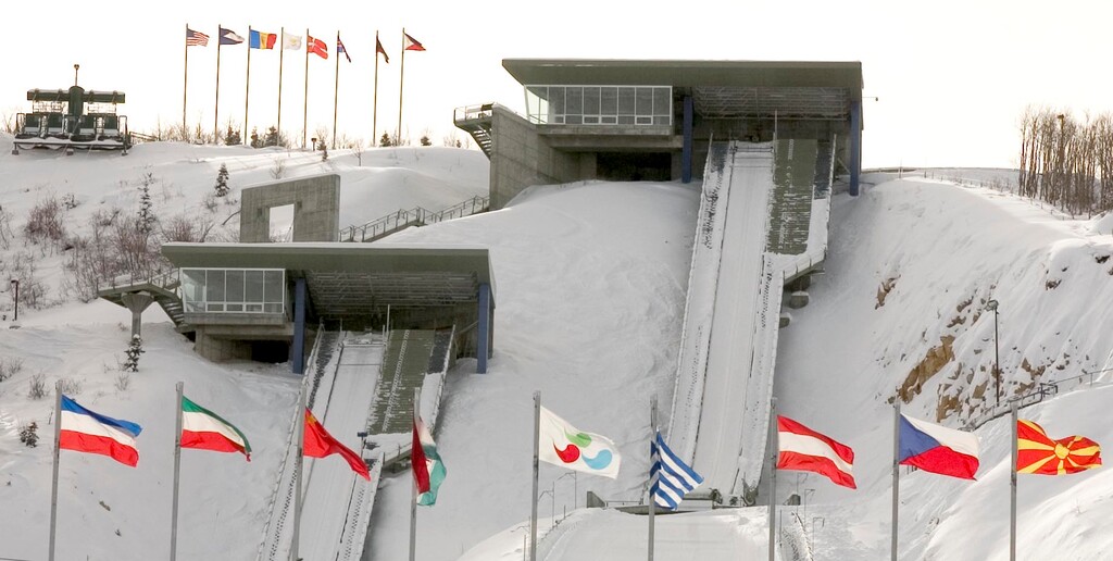 Steve Griffin  |  The Salt Lake TribuneFlags from nations around the world blow in the wind as the frame the ski jumps at the Utah Olympic Park in Park City Jan. 7, 2005. 