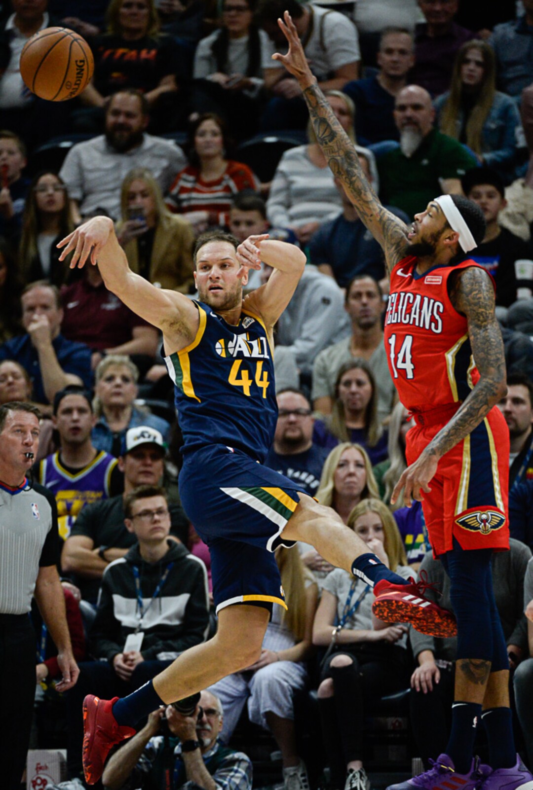 (Francisco Kjolseth  |  The Salt Lake Tribune)  Utah Jazz forward Bojan Bogdanovic (44) finds a teammate while New Orleans Pelicans forward Brandon Ingram (14) puts on the pressure as the Utah Jazz host the New Orleans Pelicans in their NBA basketball game at Vivint Smart Home Arena in Salt Lake City on Sat. Nov. 23, 2019.