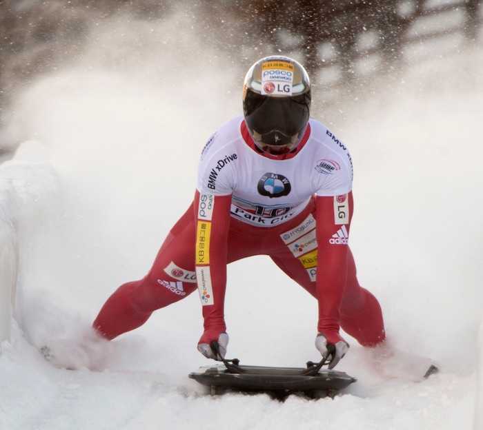 (Rick Egan  |  The Salt Lake Tribune)   Sungbin Yun finishes in first place finish in the BMW IBSF World Cup Men's Skeleton competition, Saturday, November 18, 2017.