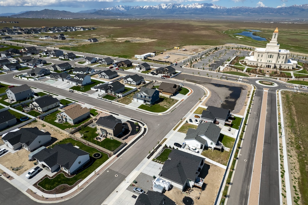(Trent Nelson | The Salt Lake Tribune) A subdivision in Tooele County on Wednesday, May 15, 2024. A recent audit found rapidly growing cities and towns, like those in Tooele County, more frequently call on developers to find water rights to supplement their existing supplies, but the municipalities arrive at those conclusions by using inconsistent data.