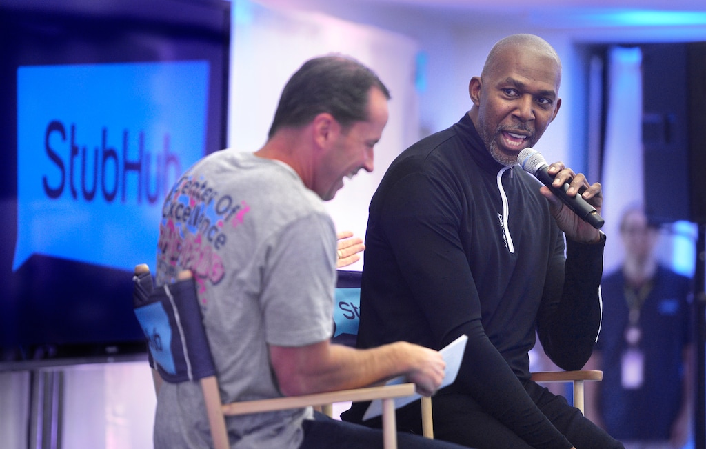 (Scott Sommerdorf | The Salt Lake Tribune)
Daron Fowlks, Head of Global Customer Experience for StubHub, left, smiles as guest speaker Thurl Bailey breaks into song during the StubHub opening reception for employees at its newly-located Center of Excellence for Customer Experience and Trust Operations in Draper, Utah, Wednesday, October 18, 2017.