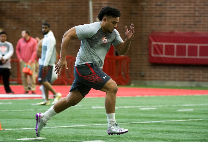 (Rick Egan  |  The Salt Lake Tribune)      Filipo Mokofisi, runs the 40-yard-dash, during University of Utah's 2018 Pro Day for NFL scouts, at Spence Eccles Field House, Wednesday, March 28, 2018.