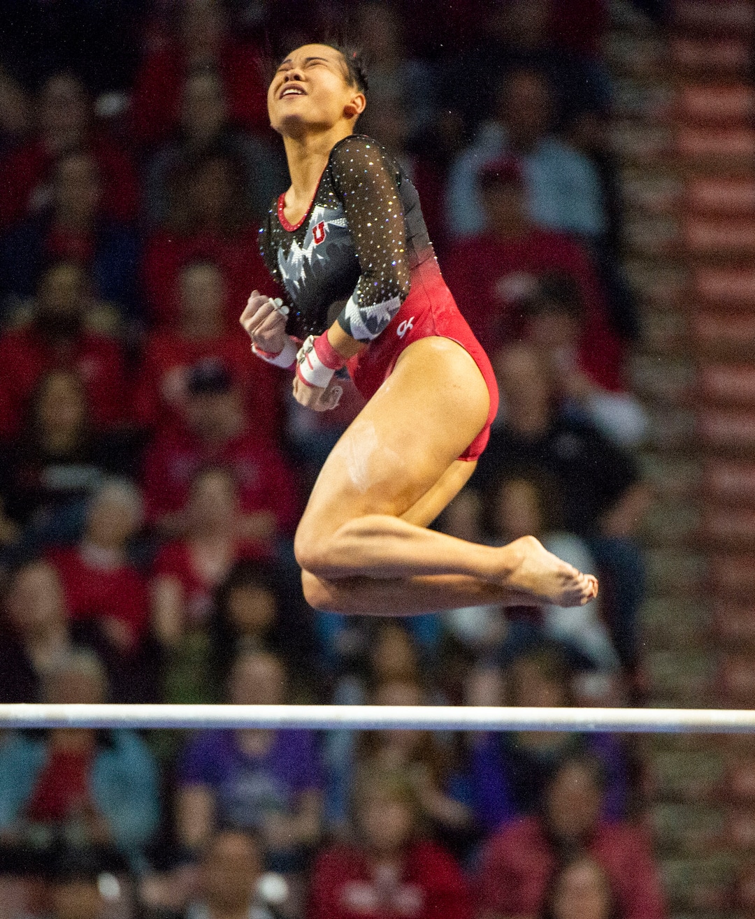 (Rick Egan  |  The Salt Lake Tribune)     Kim Tessen dismounts form the uneven bars for Utah, in the PAC-12 Gymnastics Championships at the Maverik Center, Saturday, March 23, 2019.