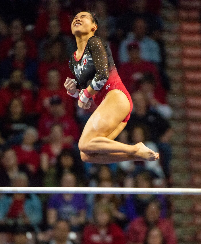 (Rick Egan  |  The Salt Lake Tribune)     Kim Tessen dismounts form the uneven bars for Utah, in the PAC-12 Gymnastics Championships at the Maverik Center, Saturday, March 23, 2019.


