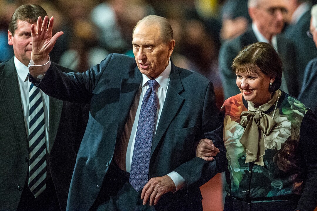 (Chris Detrick  |  The Salt Lake Tribune) President Thomas S. Monson walks off of the stage with his daughter, Ann M. Dibb, during afternoon session of the 185th Semiannual General Conference on Oct. 3, 2015.